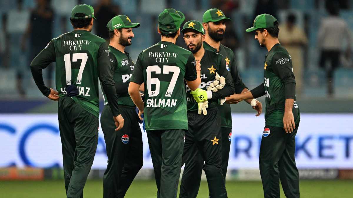 Pakistan's players celebrate their win at the end of the Asia Cup 2025 Twenty20 international cricket match between United Arab Emirates and Pakistan at the Dubai International Stadium in Dubai on September 17, 2025. (Photo by Sajjad HUSSAIN / AFP)