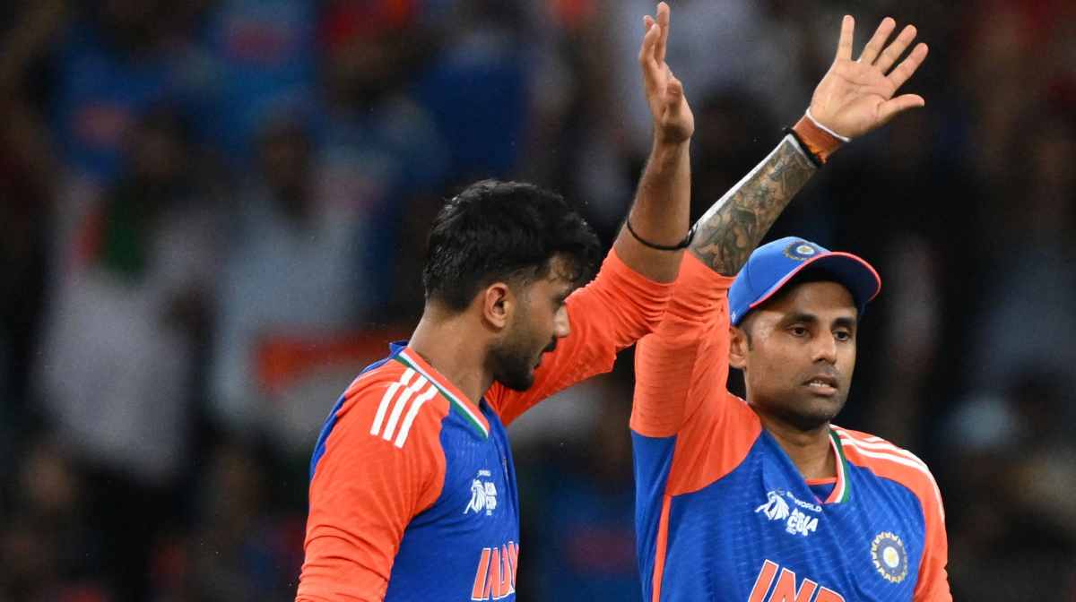 India's captain Suryakumar Yadav (R) and bowler Axar Patel celebrate after the dismissal of Pakistan's captain Salman Agha during the Asia Cup 2025 Twenty20 international cricket match between India and Pakistan at the Dubai International Stadium in Dubai on September 14, 2025. (Photo by SAJJAD HUSSAIN / AFP)