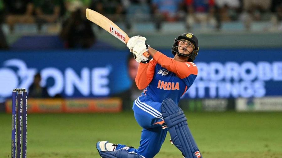 India's Abhishek Sharma watches the ball after playing a shot during the Asia Cup 2025 Super Four Twenty20 international cricket match between India and Pakistan at the Dubai International Stadium in Dubai on September 21, 2025. (Photo by Sajjad HUSSAIN / AFP)