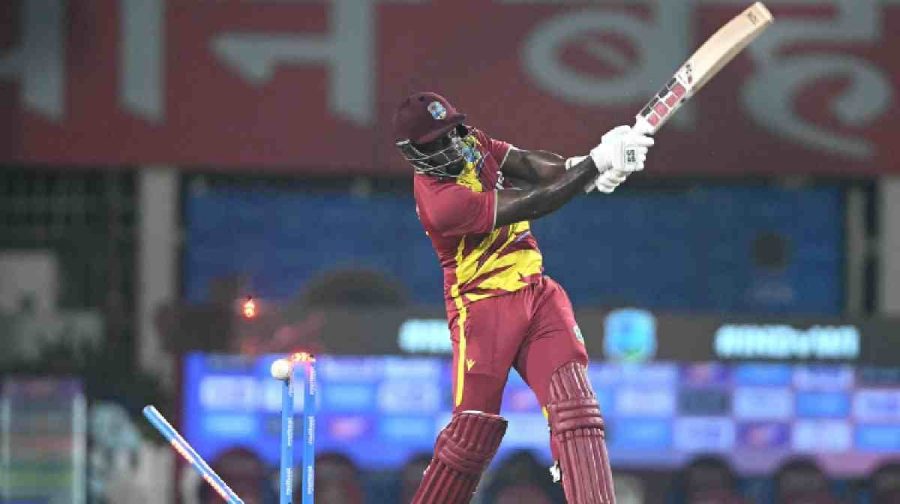 West Indies Rovman Powell is clean bowled by India's Mayank Yadav 