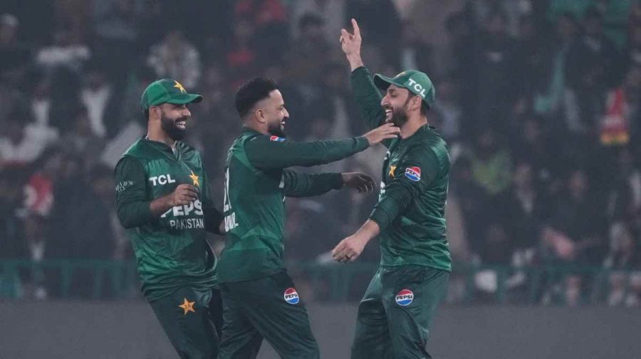 Pakistan's Mohammad Nawaz, center, celebrates with teammates after taking the wicket of Australia's Cameron Green during the third T20 cricket match between Pakistan and Australia, in Lahore, Pakistan, Sunday, Feb. 1, 2026. (AP Photo/K.M. Chaudary)