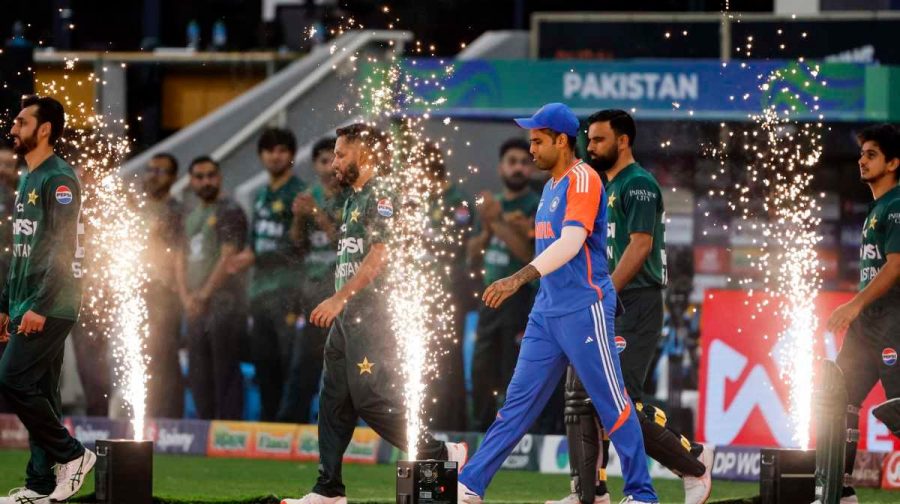 Dubai, Sep 28 (ANI): Indian and Pakistani players walk into the ground for the national anthem before the start of the Asia Cup 2025 final match, at Dubai International Cricket Stadium in Dubai on Sunday. (ANI Photo) Restrictions on the usage of the Asia Cup 2025 photographs 1. Photographs to be USED ONLY FOR EDITORIAL PURPOSES 2. Clients will publish the same strictly for editorial use. 3. For clients with digital/ broadcast services usage strictly in Bona fide news programmes/ bulletins (Excluding magazine shows, analysis, discussion programmes) 4. Clients cannot add any sponsorship, product placement or other commercial credits to these pictures. 5. Any violation of these restrictions will be the liability of the user/client concerned.
