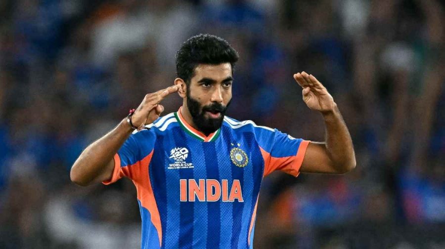 India's Jasprit Bumrah celebrates after taking the wicket of New Zealand's captain Mitchell Santner during the 2026 ICC Men's T20 Cricket World Cup final match between India and New Zealand at the Narendra Modi Stadium in Ahmedabad on March 8, 2026. (Photo by Punit PARANJPE / AFP)
