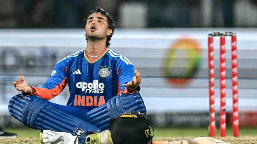 India's Abhishek Sharma celebrates after scoring a century (100 runs) during the third T20 international cricket match between India and Afghanistan at the Arun Jaitley Stadium in New Delhi on September 17, 2026. (Photo by Arun SANKAR / AFP) / -- IMAGE RESTRICTED TO EDITORIAL USE - STRICTLY NO COMMERCIAL USE --