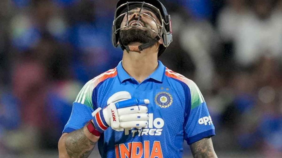 Virat Kohli celebrates during the first One Day International (ODI) cricket match between India and West Indies, in Thiruvananthapuram. Kohli becomes only the second player after Sachin Tendulkar to complete 15000 runs in One-day Internationals. (PTI Photo/R Senthilkumar)