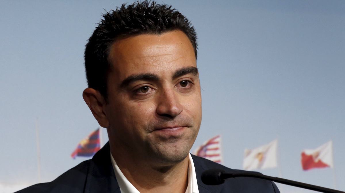 Barcelona's Xavi Hernandez announces the pregnancy of his wife Nuria Cunillera during his farewell event at Auditori 1899 in Nou Camp stadium Barcelona, Spain June 3, 2015.    REUTERS/Gustau Nacarino   
