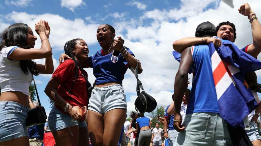 Soccer Football - FIFA World Cup 2026 - Group H - Spain v Cape Verde - Fans gather in Boston - Boston, Massachusetts, U.S. - June 15, 2026
Cape Verde fans Lwam Mahari, Viviany Barbosa Brito, Bruna Barbosa, Ginaldo Verdieu and Alex Monteiro celebrate after watching the match on a screen at Town Field Park in Dorchester REUTERS/Taylor Coester