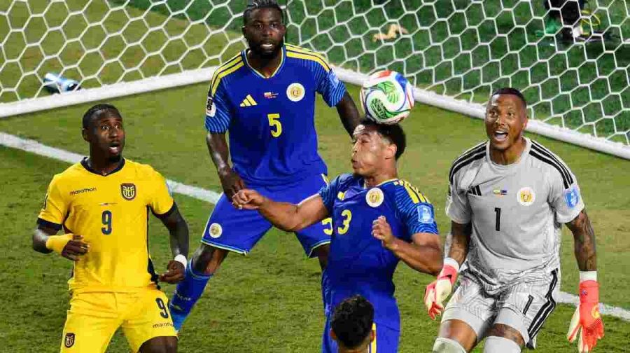 Curaçao's Jurien Gaari (3) heads the ball away on a corner kick as Ecuador's John Yeboah (9) and Curaçao goalkeeper Eloy Room (1) and Sherel Floranus (5) look on during the World Cup Group E soccer match between Ecuador and Curacao in Kansas City, Mo., Saturday, June 20, 2026. (AP Photo/Reed Hoffmann)