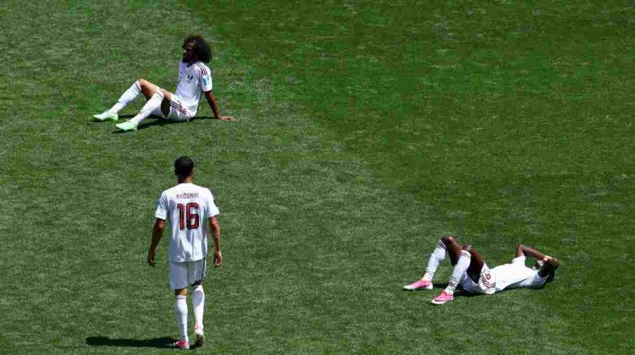 Soccer Football - FIFA World Cup 2026 - Group B - Bosnia and Herzegovina v Qatar - Seattle Stadium, Seattle, Washington, U.S. - June 24, 2026
Qatar's Akram Afif, Almoez Ali and Boualem Khoukhi look dejected after the match REUTERS/Eloisa Lopez