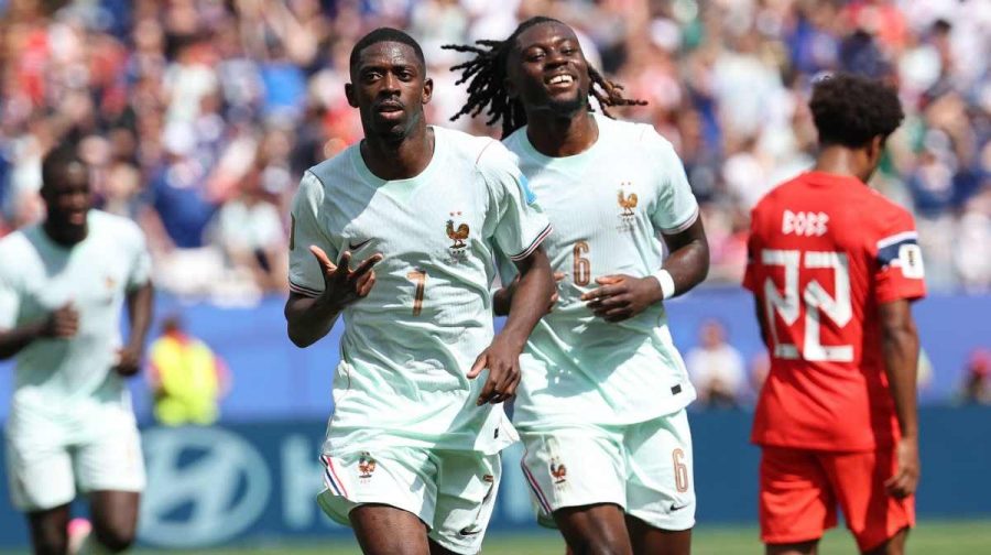 TOPSHOT - France's forward #07 Ousmane Dembele celebrates scoring his team's third goal with midfielder #06 Manu Kone during the 2026 World Cup Group I football match between Norway and France at the Boston Stadium in Foxborough on June 26, 2026. (Photo by FRANCK FIFE / AFP)