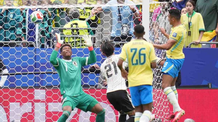 Brazil's Casemiro (5), lright, scores during the World Cup round of 32 soccer match between Brazil and Japan in Houston, Monday, June 29, 2026. (AP Photo/Karen Warren)