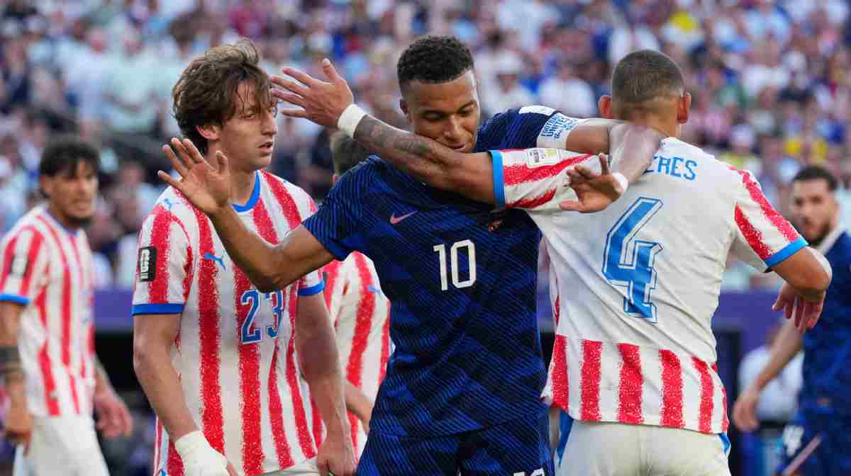 Soccer Football - FIFA World Cup 2026 - Round of 16 - Paraguay v France - Philadelphia Stadium, Philadelphia, Pennsylvania, U.S. - July 4, 2026
France's Kylian Mbappe reacts with Paraguay's Juan Jose Caceres IMAGN IMAGES via Reuters/James Lang     TPX IMAGES OF THE DAY     