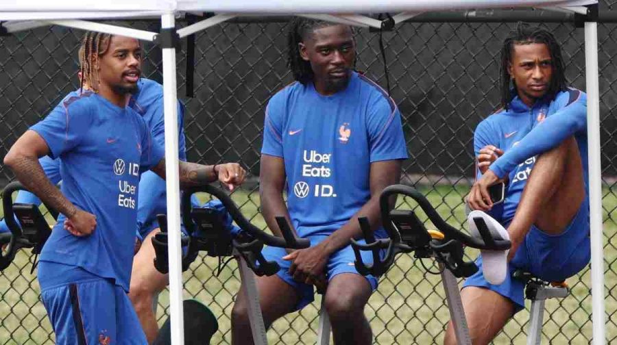 France's forward #12 Bradley Barcola, France's midfielder #06 Manu Kone and France's forward #11 Michael Olise take part a training session at Bentley University in Waltham, near Boston, on July 5, 2026, during the 2026 World Cup football tournament. (Photo by FRANCK FIFE / AFP)