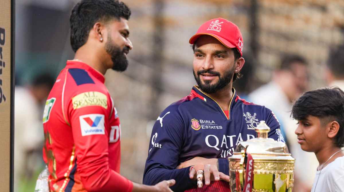 Ahmedabad: Royal Challengers Bengaluru s captain Rajat Patidar and Punjab Kings  captain Shreyas Iyer arrive for the toss before the Indian Premier League (IPL) 2025 T20 final cricket match between Royal Challengers Bengaluru and Punjab Kings, at the Narendra Modi Stadium, in Ahmedabad, Tuesday, June 3, 2025. (PTI Photo/Arun Sharma) (PTI06_03_2025_000240B)