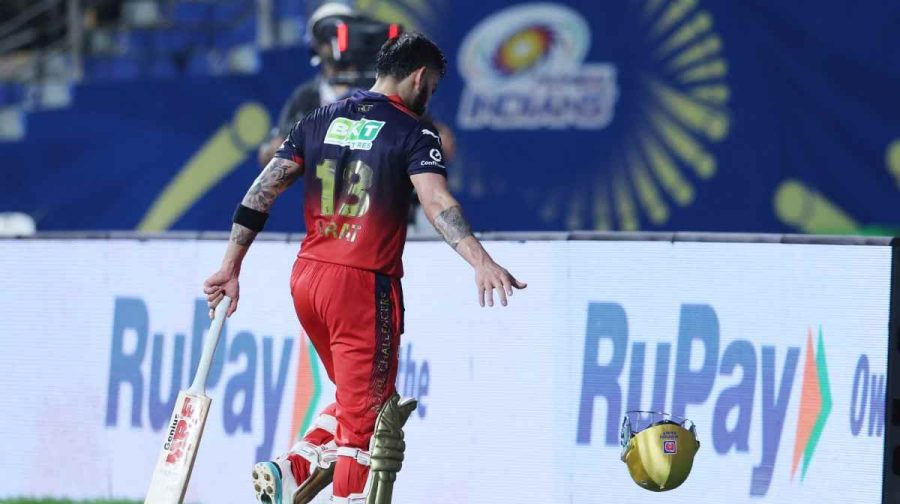 Cricket - Indian Premier League - IPL - Mumbai Indians v Royal Challengers Bengaluru - Wankhede Stadium, Mumbai, India - April 12, 2026
Royal Challengers Bengaluru's Virat Kohli reacts as he walks after losing his wicket REUTERS/Francis Mascarenhas