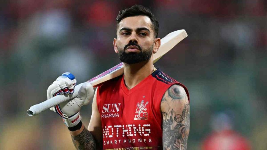 Royal Challengers Bengaluru's Indian cricket player Virat Kohli walks before the start of the 2026 Indian Premier League (IPL) T20 match between Royal Challengers Bengaluru and Lucknow Super Giants at the M Chinnaswamy Stadium in Bengaluru on April 15, 2026. (Photo by Noah SEELAM / AFP) / -- IMAGE RESTRICTED TO EDITORIAL USE - STRICTLY NO COMMERCIAL USE --