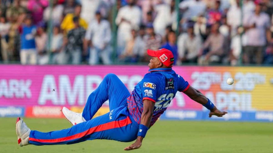 New Delhi: Delhi Capitals' Lungi Ngidi loses balance after an unsuccessful catch attempt during the Indian Premier League (IPL) 2026 T20 cricket match between Delhi Capitals and Punjab Kings, in New Delhi, Saturday, April 25, 2026. (PTI Photo/Karma Bhutia)(PTI04_25_2026_000409B)