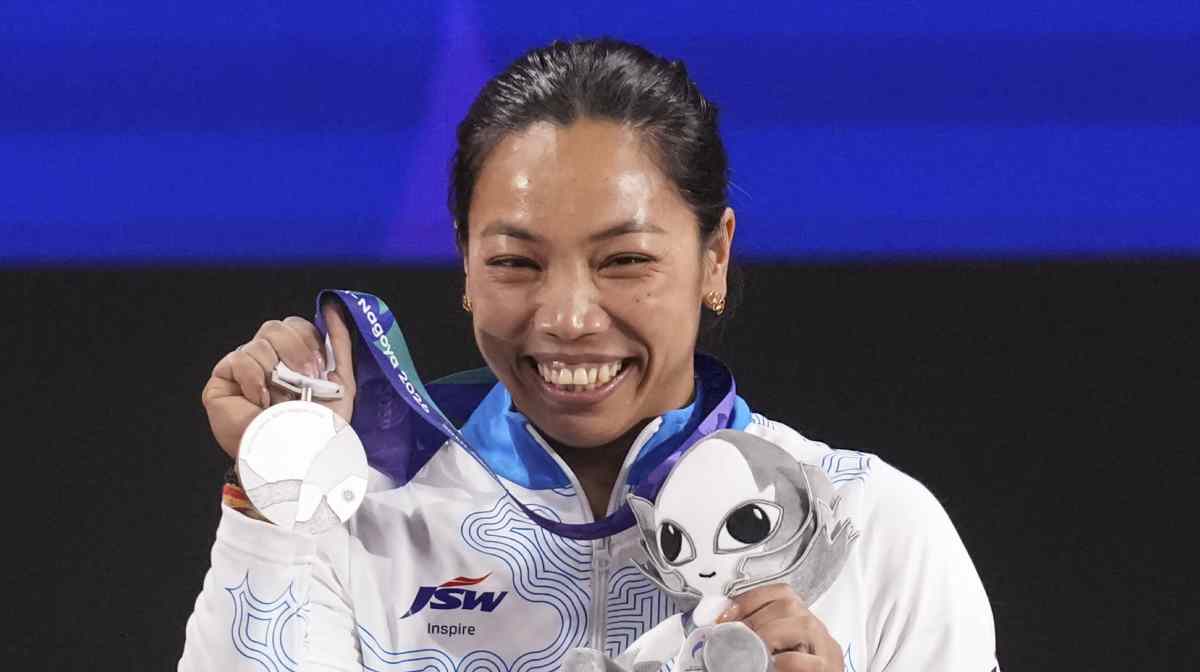 Nagoya: India s Mirabai Chanu holds a silver medal after competing in the Women s 49kg Group A weightlifting final match during the 20th Asian Games, in Nagoya, Japan, Wednesday, Sept. 23, 2026.  (PTI Photo/Arun Sharma)(PTI09_23_2026_000112B)