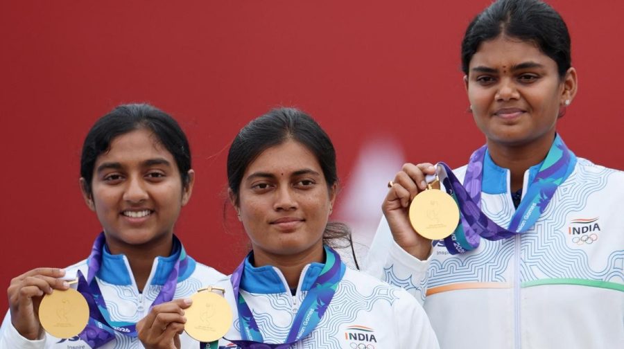 Asian Games - Aichi-Nagoya 2026 - Archery - Compound Women's Team - Victory Ceremony - China v India - Okazaki Central Park Multipurpose Square, Okazaki, Japan - September 30, 2026
Gold medallists India's Chikitha Taniparthi, Prithika Pradeep and Jyothi Surekha Vennam celebrate on the podium during the compound women's team victory ceremony REUTERS/Anushree Fadnavis