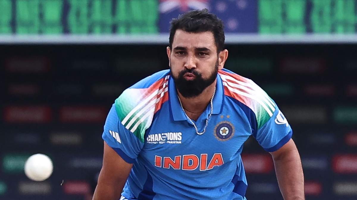 India's Mohammed Shami bowls during the ICC Champions Trophy one-day international (ODI) cricket match between New Zealand and India at the Dubai International Stadium in Dubai on March 2, 2025. (Photo by FADEL SENNA / AFP)