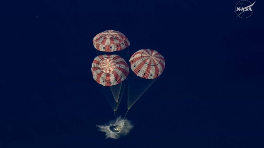This video grab made from a NASA livestream shows Artemis II astronauts splashing down in the Pacific Ocean off the coast of San Diego, California, on April 10, 2026. Christina Koch, Victor Glover, Jeremy Hansen and Wiseman completed the final phase of their 10-day journey that included a slingshot around the Moon after splashing down into the Pacific Ocean off the coast of California. (Photo by NASA / AFP) / RESTRICTED TO EDITORIAL USE - MANDATORY CREDIT "AFP PHOTO /  NASA " - HANDOUT - NO MARKETING NO ADVERTISING CAMPAIGNS - DISTRIBUTED AS A SERVICE TO CLIENTS