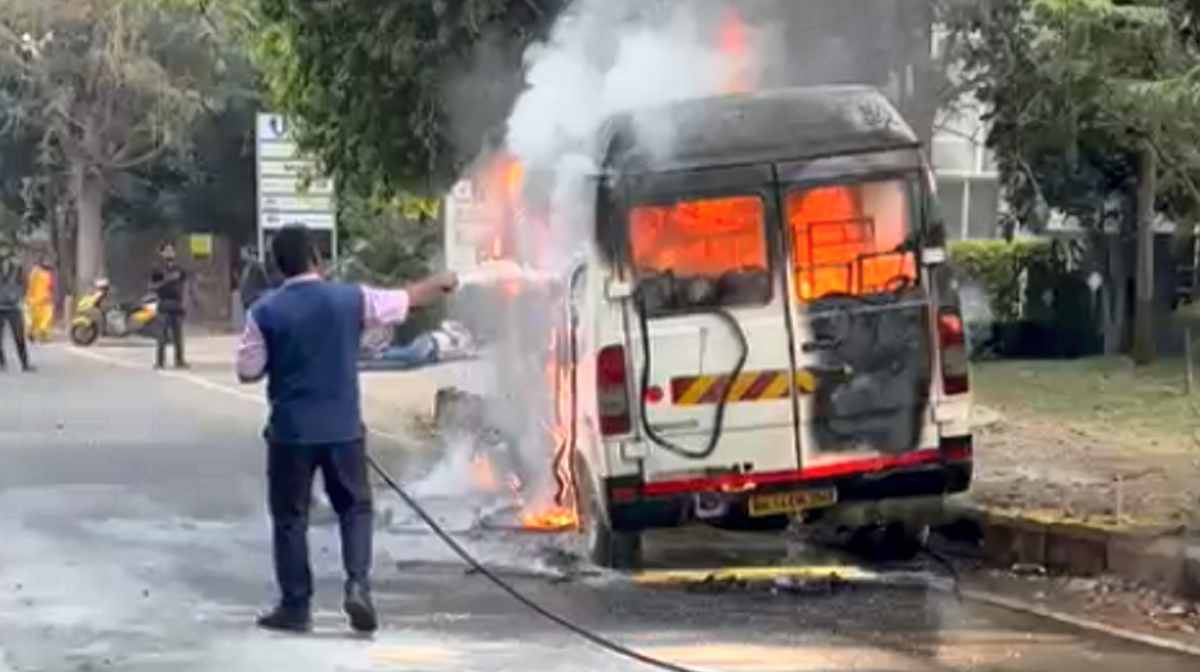 **EDS: VIDEO GRAB** Pune: A tempo traveller catches fire while it was ferrying some employees of a company to their office, at Hinjewadi, near Pune, Wednesday, March 19, 2025. At least four people were killed and five others suffered injuries in the incident, according to officials. (PTI Photo)(PTI03_19_2025_000085B)