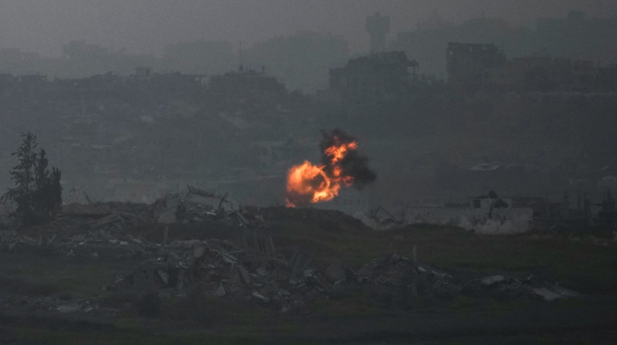 An explosion erupts in the northern Gaza Strip, as seee from southern Israel, on Tuesday, March 18, 2025. (AP Photo/Leo Correa)