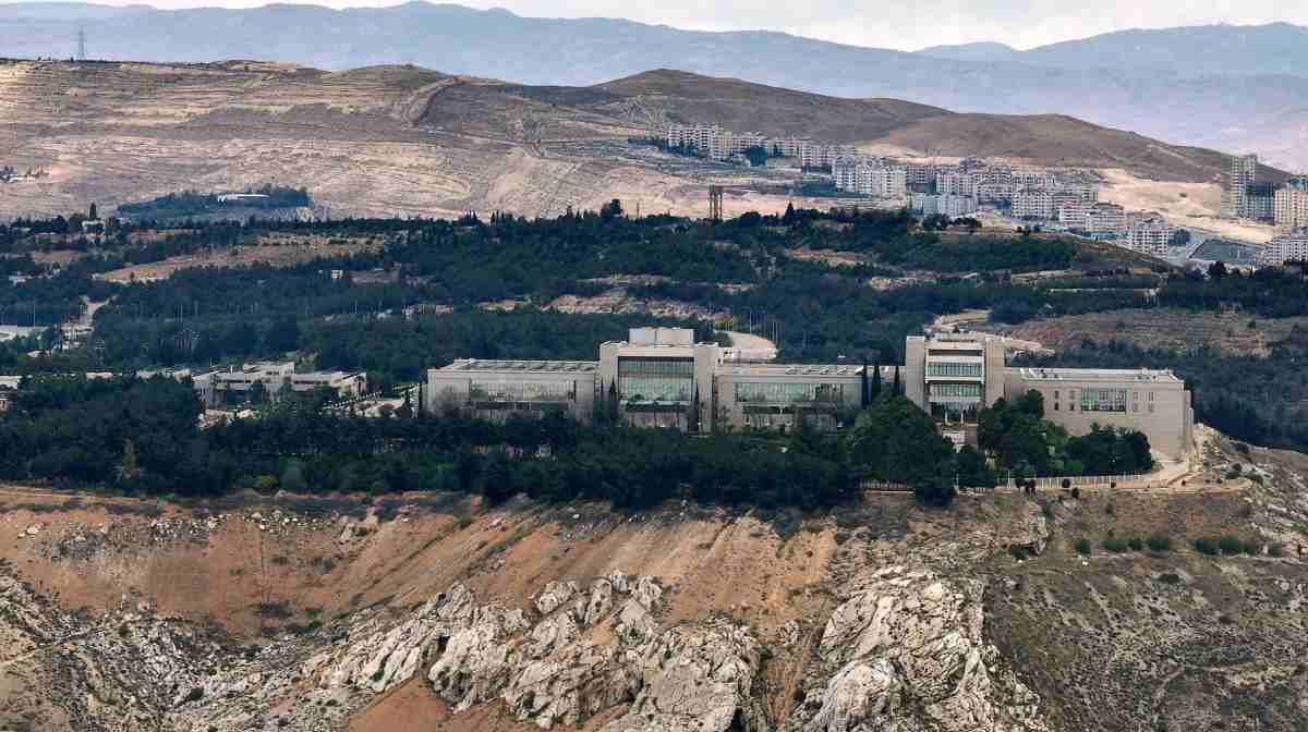 TOPSHOT - This aerial photo shows the Syrian presidential palace in Damascus' Mount Qasyoun on May 2, 2025. Israel said it carried out an air strike near Syria's presidential palace in Damascus on May 2, warning the country's new Islamist rulers against targeting the Druze minority. (Photo by Omar HAJ KADOUR / AFP)
