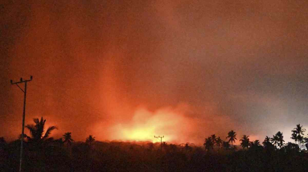 The sky glows from the eruption of Mount Lewotobi Laki-Laki early Monday, Nov. 4, 2024, in East Flores, Indonesia. (PVMBG via AP)
