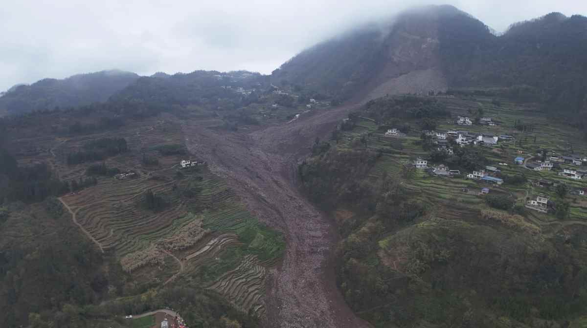 In this photo released by Xinhua News Agency, an aerial drone photo shows the site of a landslide in Jinping Village, Junlian County in the city of Yibin, southwest China's Sichuan Province, Saturday Feb. 8, 2025. (Zeng Li/Xinhua via AP)

