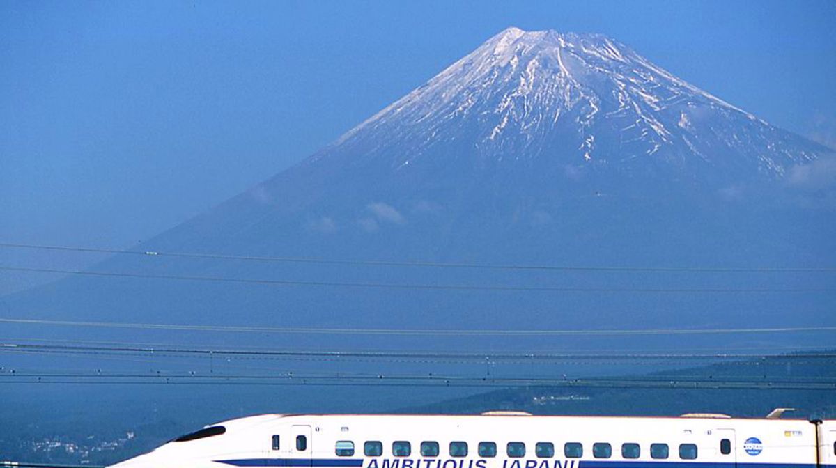 Japan's bullet train, or the 'shinkansen', speeds past Mount Fuji in Fuji city, west of Tokyo