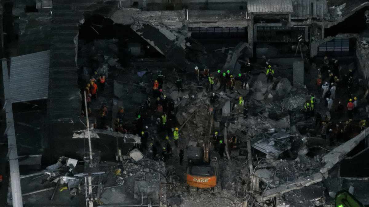 A drone view shows workers during recovery efforts at the site of the collapsed Jet Set nightclub in Santo Domingo, Dominican Republic, April 9, 2025. REUTERS/Ricardo Arduengo