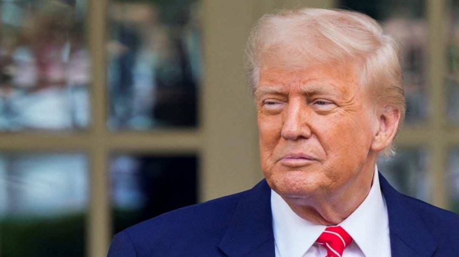 U.S. President Donald Trump looks on as he gives remarks outside the West Wing at the White House in Washington, D.C., U.S., May 8, 2025. REUTERS/Kent Nishimura