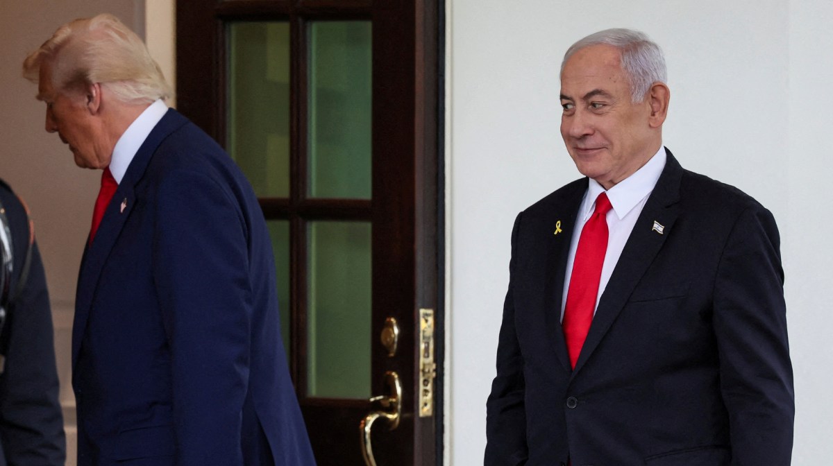 FILE PHOTO: U.S. President Donald Trump and Israeli Prime Minister Benjamin Netanyahu walk to enter the White House in Washington, D.C., U.S., April 7, 2025. REUTERS/Leah Millis/File Photo