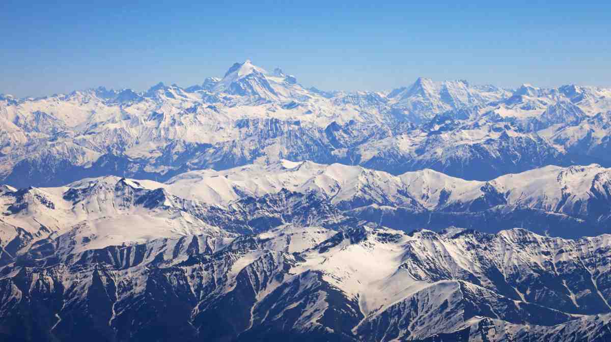 The Indian Himalayas are seen from a flight to Srinagar on May 22, 2023. India is hosting a G20 tourism working group meeting under high security in Srinagar, the capital of the disputed region of Kashmir, which has been the location of a decades-long insurgency. (Photo by Sebastien BERGER / AFP)