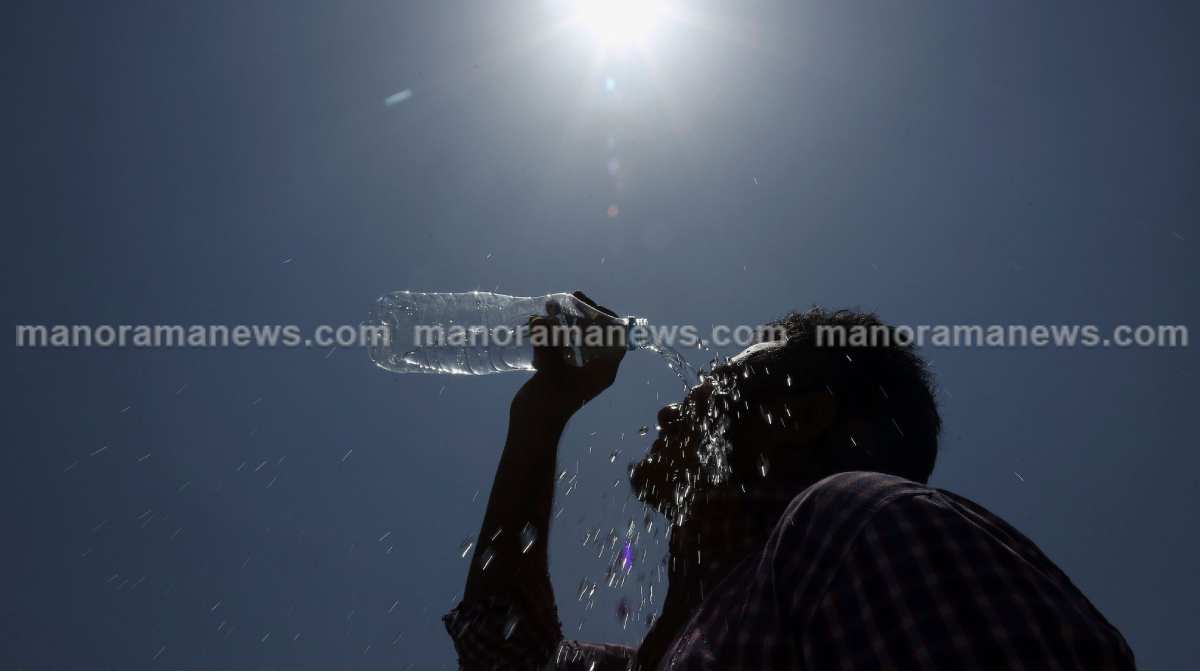 An Indian man pours water on his face during a hot summer day in Hyderabad, India, Sunday, May 24, 2015. About 230 people have died since mid-April in a heat wave sweeping two southeast Indian states, Andhra Pradesh and Telangana, officials said Saturday. Day temperatures in Telangana's Khammam district soared to more than 48 degrees Celsius (118 Fahrenheit) on Saturday. (AP Photo/Mahesh Kumar A.)