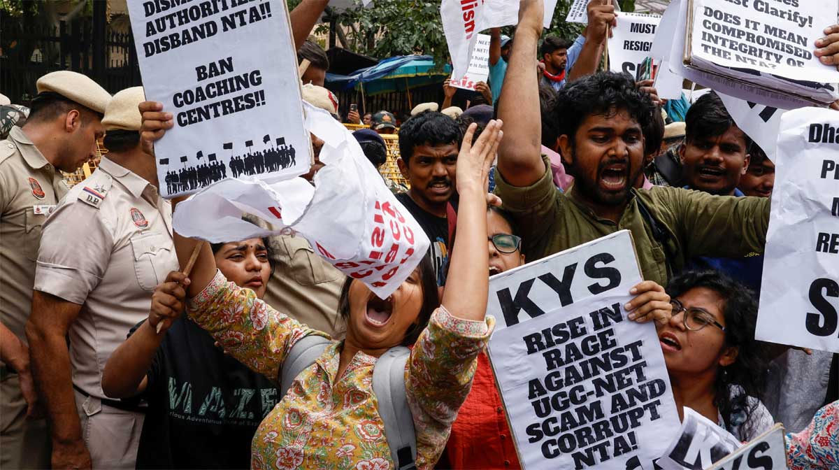 holding-placards-protest-ou holding-placards-protest-ou