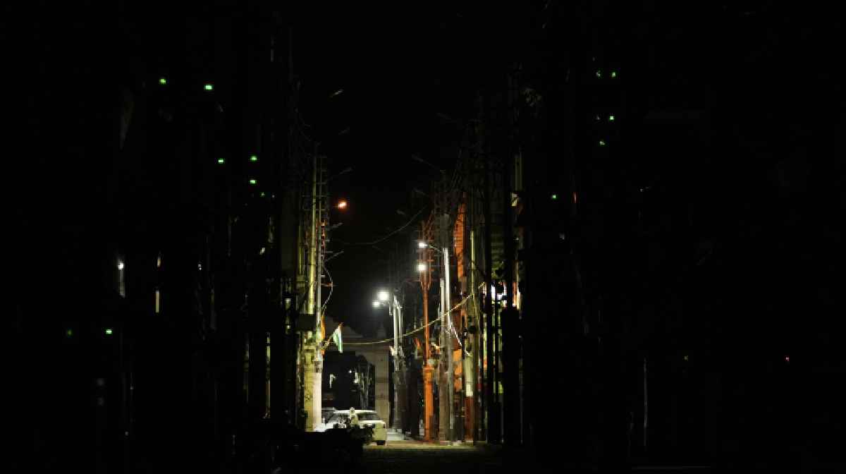 street-is-partly-lit-during-a-blackout-in-jammu-india