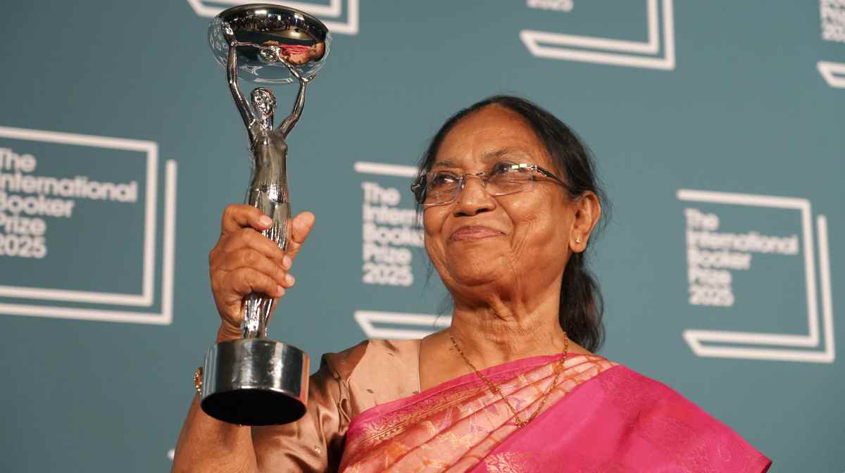 Banu Mushtaq, author of 'Heart Lamp' holds the trophy after winning the International Booker Prize, in London, Tuesday, May 20, 2025.(AP Photo/Alberto Pezzali)