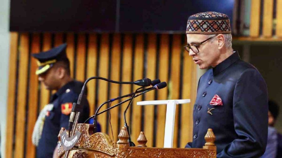 Jammu and Kashmir Lieutenant Govenor Manoj Sinha administers the oath of office to Jammu and Kashmir National Conference (JKNC) Vice President Omar Abdullah as Chief Minister of Jammu and Kashmir during the swearing-in ceremony, at Sher-i-Kashmir International Conference Centre (SKICC), in Srinagar on Wednesday. (ANI Photo)