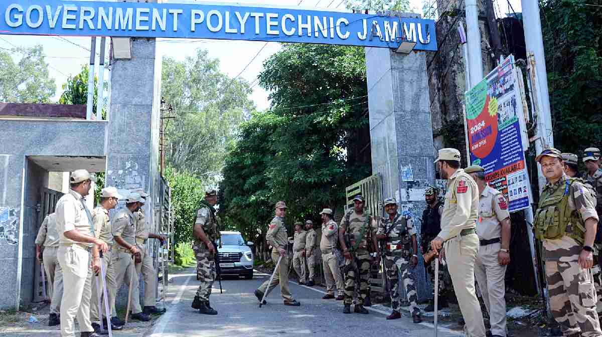Security personnel stand guard ahead of the counting of the Jammu and Kashmir Assembly elections, at Polytechnic College in Jammu on Monday. (ANI Photo)