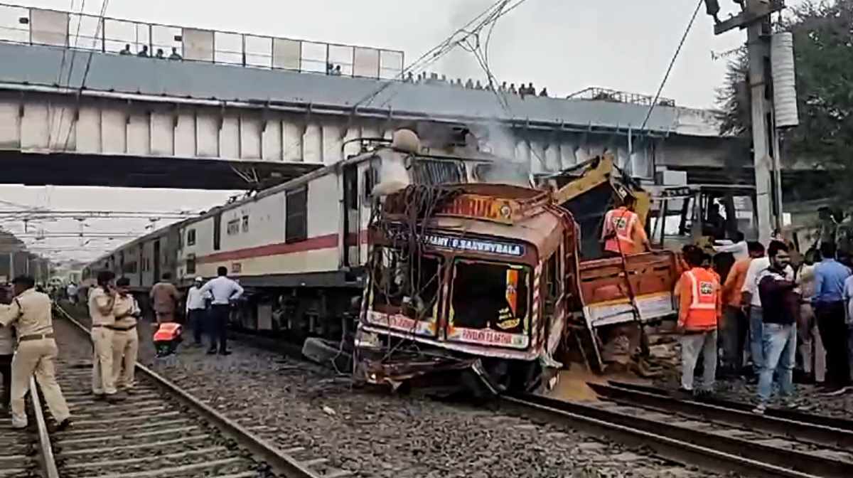 Authorities at the site after a truck collided with Mumbai-Amravati Express at Bodwad Railway station, in Jalgaon on Friday. (ANI Photo)
