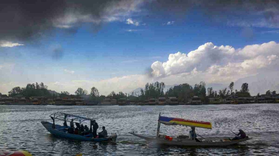 Tourists ride 'Shikara' at the Dal Lake, seen a day after the Pahalgam terror attack, in Srinagar, Wednesday, April 23, 2025. At least 26 people were killed in the terrorist attack in J&K's Pahalgam on Tuesday. (PTI Photo)