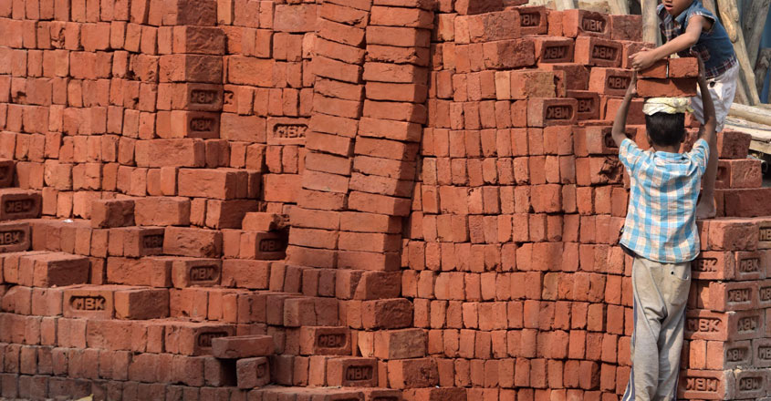 Children-loading-bricks Children-loading-bricks