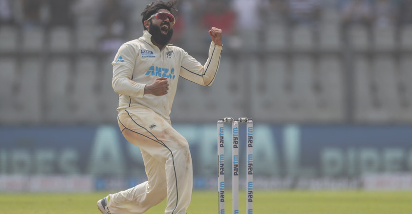 New Zealand's Ajaz Patel celebrates the dismissal of India's Mohammed Siraj during the day two of their second test cricket match with India in Mumbai, India, Saturday, Dec. 4, 2021.(AP Photo/Rafiq Maqbool)