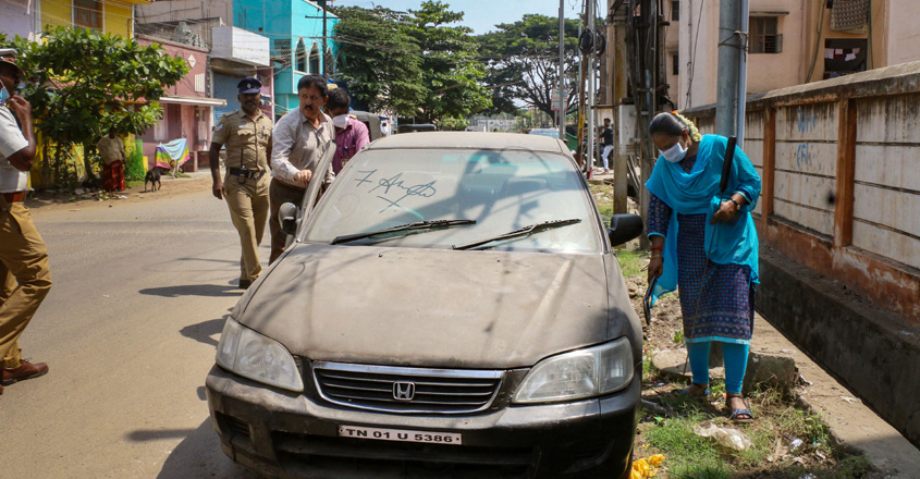 Security personnel check a parked vehicle after an LPG cylinder exploded inside a car recently, in Coimbatore | PTI