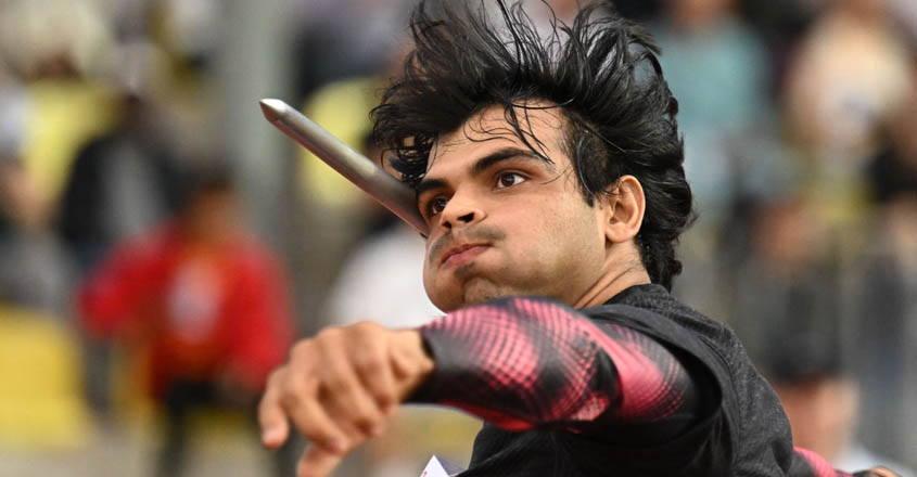 India's Neeraj Chopra competes in the men's javelin event during the Diamond League athletics meeting at Stade Olympique de la Pontaise in Lausanne on August 26, 2022. (Photo by Fabrice COFFRINI / AFP)