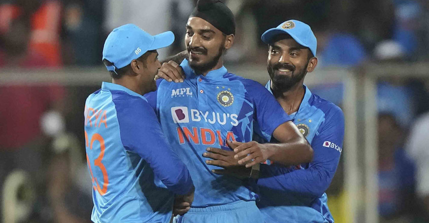 India's Arshdeep Singh, center, celebrates the dismissal of South Africa's David Miller during the first Twenty20 cricket match between India and South Africa in Thiruvananthapuram, India, Wednesday, Sept. 28, 2022. (AP Photo/Mahesh Kumar A.)
