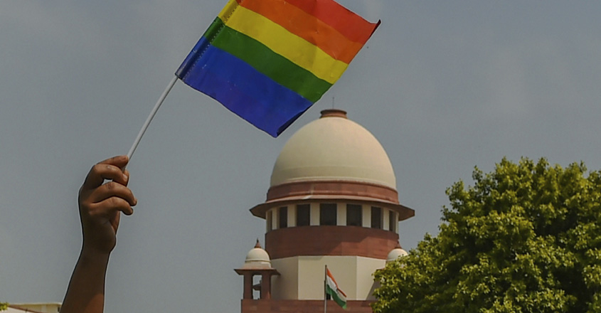 activist-waves-a-rainbow-fl