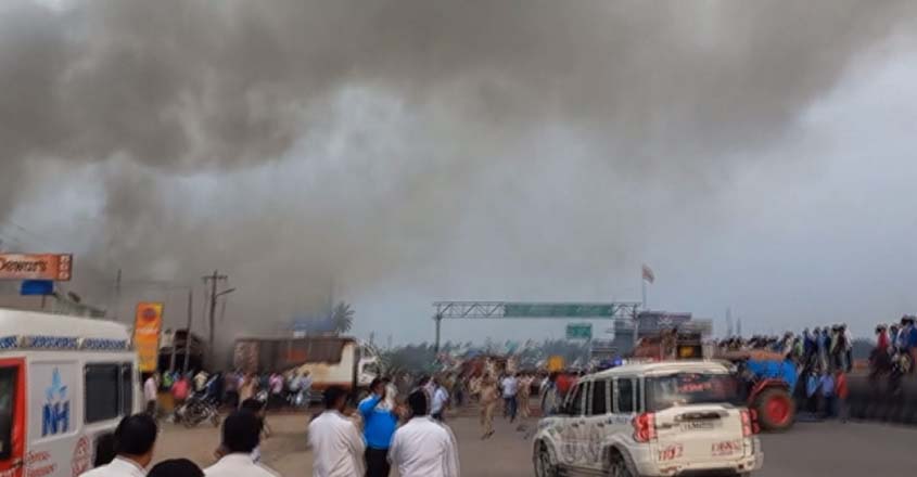**EDS: VIDEO GRAB** Bengaluru: Smoke billows after a fire broke out at a firecracker shop, in Bengaluru, Saturday, Oct. 7, 2023. At least 12 people were killed, according to police. (PTI Photo)(PTI10_07_2023_000617B)